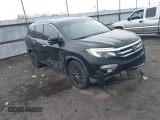 2017 Honda Pilot Touring with VIN 5FNYF5H9XHB014096, listed as a IAAI auction lot 41003430 with 168,120 mi miles. Bid and sale history available at carsss.com. Image 1.