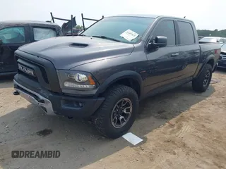 2017 Ram 1500 Rebel with VIN 1C6RR7YT6HS861839, listed as a IAAI auction lot 42407025 with 127,084 mi miles and . Bid and sale history available at DreamBid. Image 2.