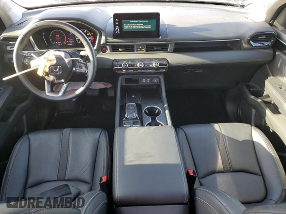 2023 Honda Pilot Touring with VIN 5FNYG2H77PB006594, listed as a Copart auction lot 83662854 with 37,637 mi miles and Salvage Title. Bid and sale history available at DreamBid. Image 8.