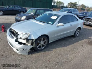 2009 Mercedes-Benz CLK-Class 3.5L with VIN WDBTJ56H89F266069, listed as a IAAI auction lot 41993748 with 141,828 mi miles. Bid and sale history available at carsss.com. Image 2.
