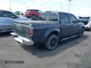 2014 Nissan Frontier SV with VIN 1N6AD0ER8EN756702, listed as a IAAI auction lot 42021294 with 135,143 mi miles and . Bid and sale history available at DreamBid. Image 4.