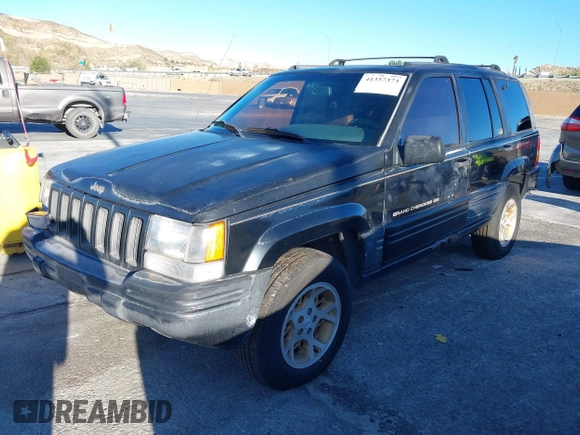 1998 Jeep Grand Cherokee Limited with VIN 1J4GX78Y8WC110325, listed as a IAAI auction lot 41357373 with 165,106 mi miles. Bid and sale history available at carsss.com. Image 2.