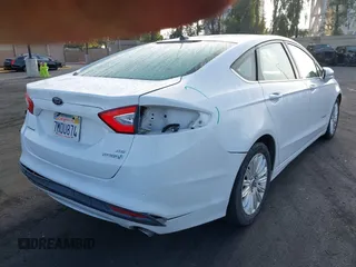 2016 Ford Fusion SE Hybrid with VIN 3FA6P0LU4GR144591, listed as a IAAI auction lot 42592828 with 96,184 mi miles and . Bid and sale history available at DreamBid. Image 4.