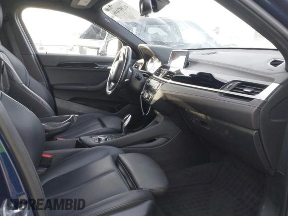 2020 BMW X2 sDrive28i with VIN WBXYH9C02L5P01502, listed as a IAAI auction lot 41397416 with 82,660 mi miles. Bid and sale history available at carsss.com. Image 5.