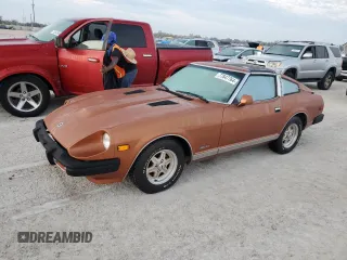 1981 Datsun 280ZX z VIN JN1HZ04SXBX259192, wystawiony jako Copart lot #77847764 z przebiegiem 91 619 mil mil oraz Szkody całkowita. Historia ofert i sprzedaży dostępna na DreamBid. Obrazek 1.