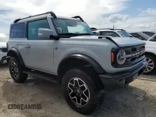 2021 Ford Bronco z VIN 1FMDE5CP4MLA65927, wystawiony jako Copart lot #74809974 z przebiegiem 41 296 mil mil oraz Nie do naprawy • Non repairable. Historia ofert i sprzedaży dostępna na DreamBid. Obrazek 4.