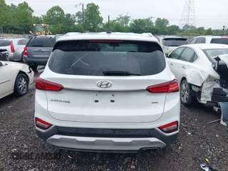 2019 Hyundai Santa Fe SE with VIN 5NMS2CAD1KH032805, listed as a IAAI auction lot 42385798 with Not provided miles and . Bid and sale history available at DreamBid. Image 15.