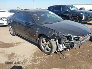 2007 Pontiac Grand Prix GXP with VIN 2G2WC58C571226261, listed as a IAAI auction lot 41487187 with 133,038 mi miles and . Bid and sale history available at DreamBid. Image 1.