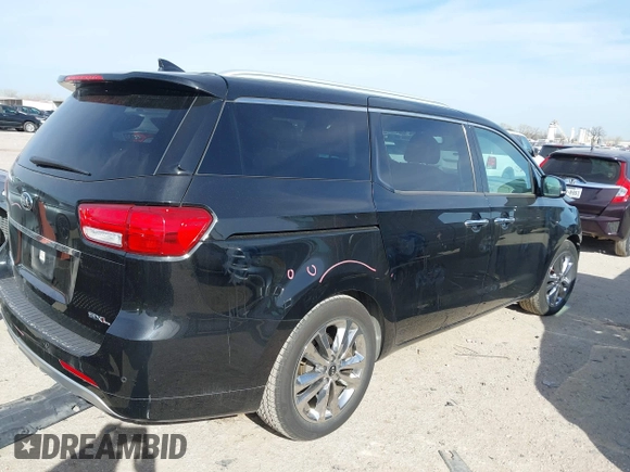 2015 Kia Sedona SX-L with VIN KNDME5C10F6033882, listed as a IAAI auction lot 41808805 with 81,936 mi miles and . Bid and sale history available at DreamBid. Image 4.