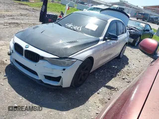 2014 BMW 3 Series 320i with VIN WBA3B1C51EK132083, listed as a IAAI auction lot 41985295 with 158,626 mi miles. Bid and sale history available at carsss.com. Image 2.