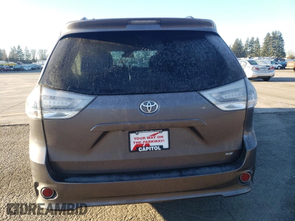 2015 Toyota Sienna SE with VIN 5TDXK3DC6FS644459, listed as a Copart auction lot 42600115 with 126,007 mi miles and Salvage Title. Bid and sale history available at carsss.com. Image 6.