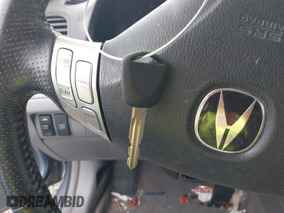 2004 Acura TSX with VIN JH4CL96844C030143, listed as a IAAI auction lot 42035820 with 216,588 mi miles. Bid and sale history available at carsss.com. Image 11.