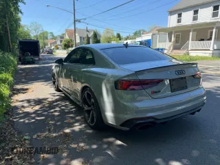 2018 Audi RS 5 z VIN WUAPWAF50JA904659, wystawiony jako Copart lot #57560835 z przebiegiem 88 168 mil mil oraz Tytuł czysty. Historia ofert i sprzedaży dostępna na DreamBid. Obrazek 3.