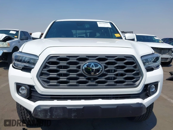 2023 Toyota Tacoma SR with VIN 3TMCZ5AN7PM630874, listed as a IAAI auction lot 40298041 with 8,635 mi miles and . Bid and sale history available at DreamBid. Image 12.