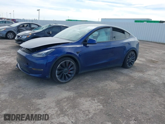 2021 Tesla Model Y Performance z VIN 5YJYGDEF8MF245641, wystawiony jako IAAI lot #41685230 z przebiegiem 25 903 mil mil oraz . Historia ofert i sprzedaży dostępna na DreamBid. Obrazek 13.