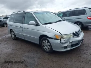 2003 Honda Odyssey EX-L z VIN 5FNRL18033B096575, wystawiony jako IAAI lot #41576926 z przebiegiem 210 932 mil mil oraz . Historia ofert i sprzedaży dostępna na DreamBid. Obrazek 1.
