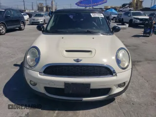2009 MINI Hardtop S with VIN WMWMF73569TW80561, listed as a Copart auction lot 52615805 with 109,968 mi miles and Salvage title. Bid and sale history available at DreamBid. Image 5.