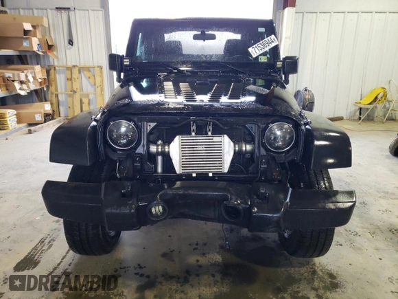 2013 Jeep Wrangler Rubicon with VIN 1C4BJWCG1DL584611, listed as a Copart auction lot 71536944 with 142,975 mi miles and Salvage title. Bid and sale history available at DreamBid. Image 5.