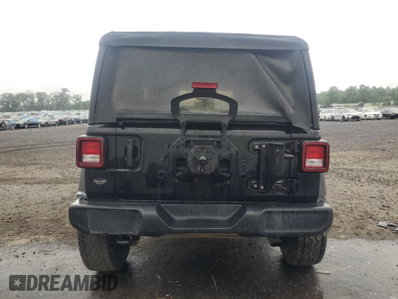 2020 Jeep Wrangler Sport S with VIN 1C4GJXAN7LW343890, listed as a Copart auction lot 63363335 with 74,179 mi miles and Salvage title. Bid and sale history available at DreamBid. Image 6.