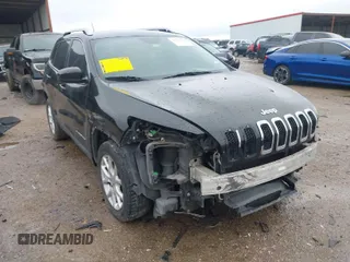 2015 Jeep Cherokee Latitude with VIN 1C4PJLCS6FW560976, listed as a IAAI auction lot 41544954 with 191,557 mi miles. Bid and sale history available at carsss.com. Image 1.