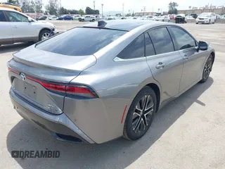 2021 Toyota Mirai XLE with VIN JTDAAAAA7MA002925, listed as a IAAI auction lot 42227628 with 44,485 mi miles and . Bid and sale history available at DreamBid. Image 4.
