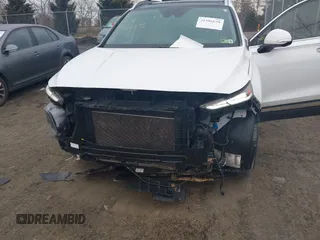 2020 Hyundai Santa Fe Limited with VIN 5NMS5CAD8LH286830, listed as a IAAI auction lot 41586628 with 80,381 mi miles and . Bid and sale history available at DreamBid. Image 6.