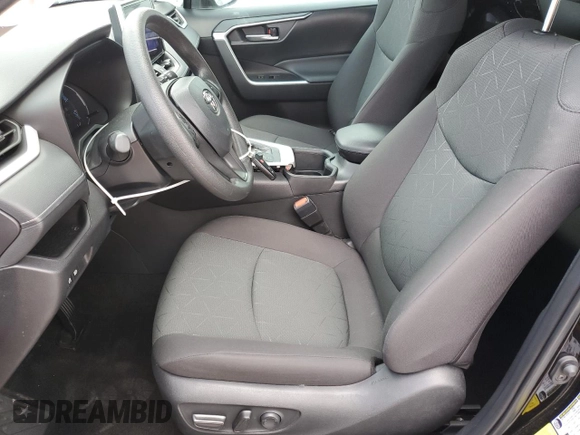 2024 Toyota RAV4 Hybrid LE with VIN 2T3UWRFV3RW204615, listed as a Copart auction lot 64436455 with 8,710 mi miles and Clean title. Bid and sale history available at DreamBid. Image 7.