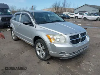 2010 Dodge Caliber SXT with VIN 1B3CB4HAXAD550376, listed as a IAAI auction lot 41952369 with 174,418 mi miles and . Bid and sale history available at DreamBid. Image 1.