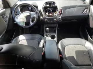 2011 Hyundai Tucson Limited with VIN KM8JUCAC2BU200517, listed as a Copart auction lot 53252005 with 158,502 mi miles and Salvage Title. Bid and sale history available at DreamBid. Image 8.