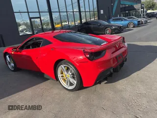 2016 Ferrari 488 z VIN ZFF79ALA0G0214884, wystawiony jako Copart lot #58627785 z przebiegiem 6311 mil mil oraz Szkody całkowita. Historia ofert i sprzedaży dostępna na DreamBid. Obrazek 3.