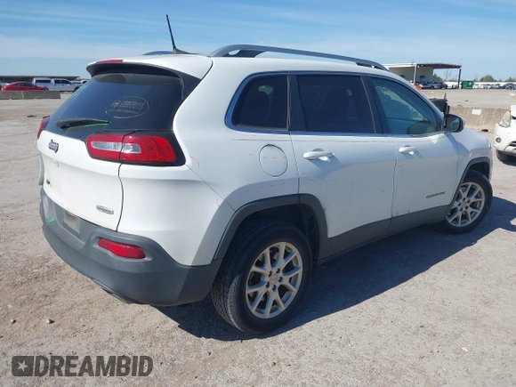 2016 Jeep Cherokee Latitude z VIN 1C4PJLCS0GW138381, wystawiony jako IAAI lot #41844589 z przebiegiem 100 991 mil mil oraz . Historia ofert i sprzedaży dostępna na DreamBid. Obrazek 4.