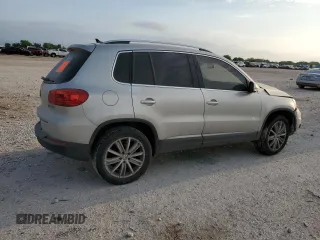 2012 Volkswagen Tiguan SEL with VIN WVGAV7AX2CW529098, listed as a Copart auction lot 53349565 with 128,603 mi miles and Salvage Title. Bid and sale history available at DreamBid. Image 3.