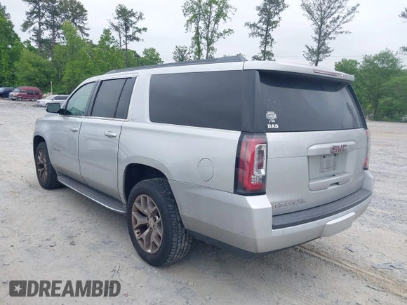2015 GMC Yukon XL SLT with VIN 1GKS1HKC2FR251672, listed as a IAAI auction lot 42152312 with 232,736 mi miles and . Bid and sale history available at carsss.com. Image 3.