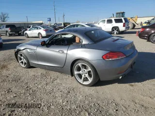 2011 BMW Z4 sDrive30i with VIN WBALM5C53BE380525, listed as a Copart auction lot 42004835 with 103,573 mi miles and Salvage Title. Bid and sale history available at carsss.com. Image 2.
