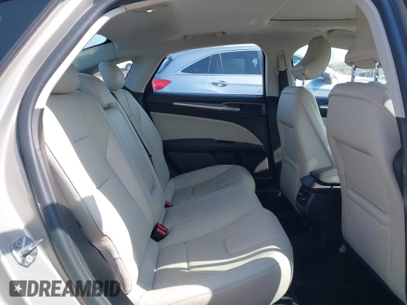 2016 Ford Fusion Titanium Hybrid with VIN 3FA6P0RU5GR171287, listed as a IAAI auction lot 41918195 with 74,721 mi miles. Bid and sale history available at carsss.com. Image 8.