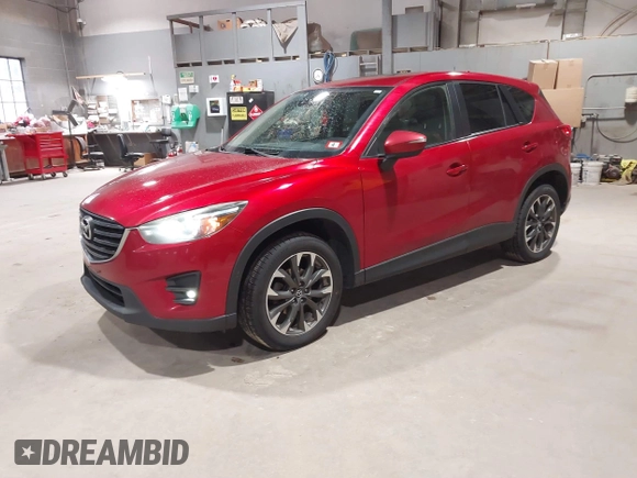 2016 Mazda CX-5 Grand Touring with VIN JM3KE4DY6G0690923, listed as a IAAI auction lot 41875553 with 179,489 mi miles. Bid and sale history available at carsss.com. Image 17.