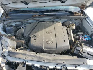 2015 Toyota Tacoma с VIN 5TFLU4EN3FX132165, выставлен на аукционе Copart как лот 62501525 с пробегом 180 887 миль миль и Списание • Salvage title. История ставок и продаж доступна на DreamBid. Изображение 11.