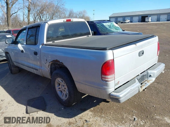 2001 Dodge Dakota Sport with VIN 1B7HL2AN51S310862, listed as a IAAI auction lot 41436565 with 152,425 mi miles. Bid and sale history available at carsss.com. Image 3.