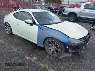 2013 Scion FR-S z VIN JF1ZNAA12D1726048, wystawiony jako IAAI lot #41742391 z przebiegiem 130 234 mil mil oraz . Historia ofert i sprzedaży dostępna na DreamBid. Obrazek 1.