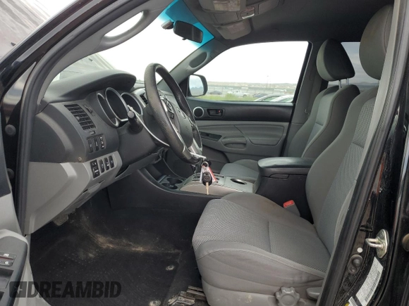 2014 Toyota Tacoma with VIN 3TMLU4EN8EM145918, listed as a Copart auction lot 60435105 with 121,046 mi miles and Salvage title. Bid and sale history available at DreamBid. Image 7.