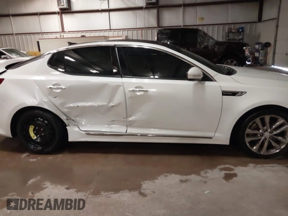 2015 Kia Optima SXL Turbo with VIN 5XXGR4A67FG395283, listed as a IAAI auction lot 41277314 with 171,473 mi miles and . Bid and sale history available at DreamBid. Image 14.