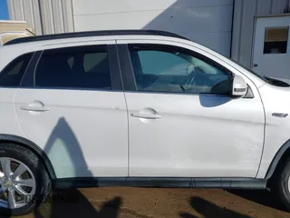 2015 Mitsubishi Outlander Sport 2.4 GT with VIN 4A4AR4AWXFE033631, listed as a IAAI auction lot 41830291 with 115,920 mi miles. Bid and sale history available at carsss.com. Image 14.
