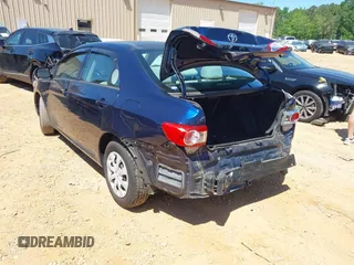 2013 Toyota Corolla L with VIN 5YFBU4EE7DP134542, listed as a IAAI auction lot 42124149 with 135,868 mi miles and . Bid and sale history available at DreamBid. Image 3.