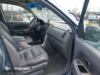 2007 Honda Pilot EX-L with VIN 5FNYF28597B006341, listed as a IAAI auction lot 41808955 with 225,819 mi miles. Bid and sale history available at carsss.com. Image 5.