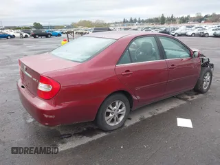 2005 Toyota Camry LE with VIN 4T1BF32K95U092132, listed as a IAAI auction lot 41831969 with 103,466 mi miles and . Bid and sale history available at DreamBid. Image 4.