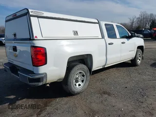 2017 Chevrolet Silverado 1500 Work Truck with VIN 1GCVKNEH5HZ377457, listed as a IAAI auction lot 41411359 with 154,971 mi miles. Bid and sale history available at carsss.com. Image 4.