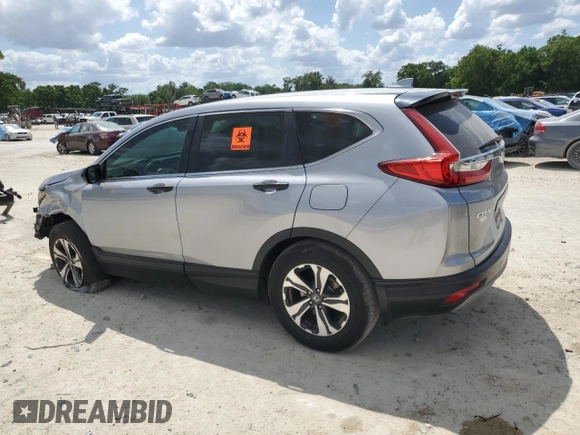 2018 Honda CR-V LX with VIN 5J6RW5H36JL003805, listed as a Copart auction lot 52679775 with 37,409 mi miles and Salvage Title. Bid and sale history available at carsss.com. Image 2.