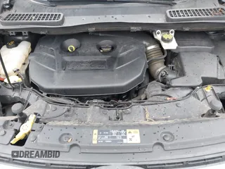 2015 Ford Escape Titanium with VIN 1FMCU0J97FUB45709, listed as a IAAI auction lot 41561636 with 88,296 mi miles. Bid and sale history available at carsss.com. Image 10.