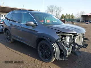 2022 Honda Pilot Special Edition with VIN 5FNYF6H28NB015896, listed as a IAAI auction lot 41672468 with 56,581 mi miles. Bid and sale history available at carsss.com. Image 1.