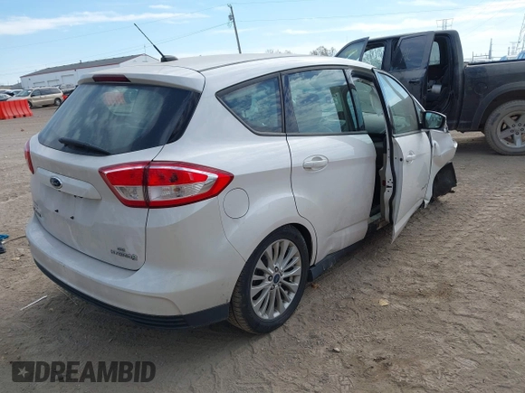 2018 Ford C-Max SE with VIN 1FADP5AU9JL101345, listed as a IAAI auction lot 40675761 with 96,842 mi miles and . Bid and sale history available at DreamBid. Image 4.